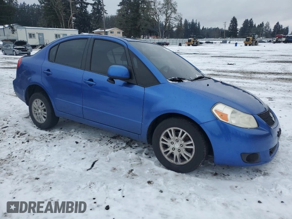 2012 Suzuki SX4 LE z VIN JS2YC5A30C6305375, wystawiony jako Copart lot #45429185 z przebiegiem 103 283 mil mil oraz Szkoda całkowita • Salvage title. Historia ofert i sprzedaży dostępna na DreamBid. Obrazek 4.