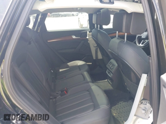 2021 Audi Q5 Premium Plus with VIN WA1BAAFY7M2024762, listed as a IAAI auction lot 42090408 with 58,082 mi miles and . Bid and sale history available at DreamBid. Image 8.