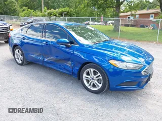 2018 Ford Fusion SE z VIN 3FA6P0LU9JR171096, wystawiony jako IAAI lot #42329683 z przebiegiem 126 463 mil mil oraz . Historia ofert i sprzedaży dostępna na DreamBid. Obrazek 1.