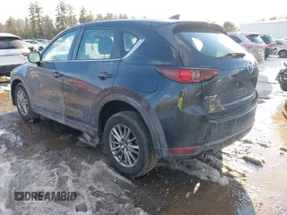 2018 Mazda CX-5 Sport with VIN JM3KFBBM8J0372701, listed as a IAAI auction lot 41643531 with 85,886 mi miles. Bid and sale history available at carsss.com. Image 3.