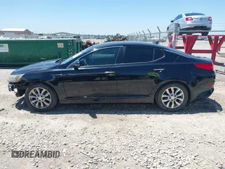 2015 Kia Optima EX z VIN 5XXGN4A76FG353935, wystawiony jako IAAI lot #42292395 z przebiegiem 161 085 mil mil oraz . Historia ofert i sprzedaży dostępna na DreamBid. Obrazek 15.