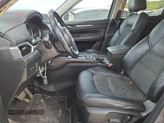 2018 Mazda CX-5 Touring z VIN JM3KFBCM4J0349687, wystawiony jako Copart lot #55857945 z przebiegiem Nie podano mil oraz Szkoda całkowita • Salvage title. Historia ofert i sprzedaży dostępna na DreamBid. Obrazek 7.