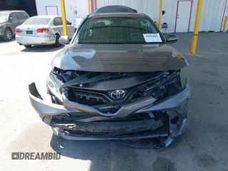 2019 Toyota Camry LE with VIN 4T1B11HK8KU204599, listed as a IAAI auction lot 42096889 with 76,518 mi miles and . Bid and sale history available at DreamBid. Image 13.