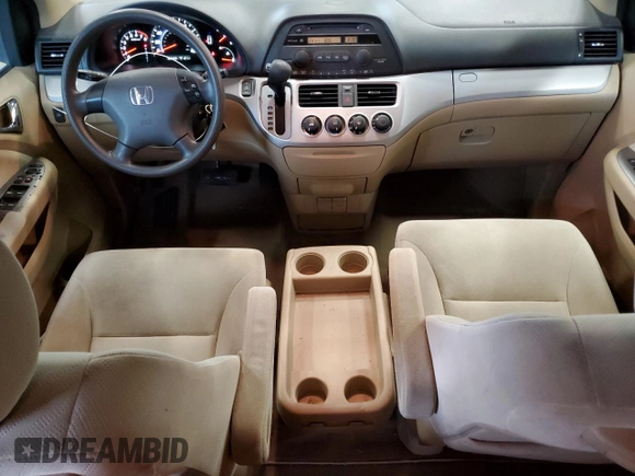2009 Honda Odyssey LX with VIN 5FNRL38259B018546, listed as a Copart auction lot 62142015 with 162,459 mi miles and Salvage title. Bid and sale history available at DreamBid. Image 8.