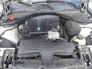 2015 BMW 3 Series 328i with VIN WBA3A5C50FF608327, listed as a IAAI auction lot 42136156 with 213,945 mi miles. Bid and sale history available at carsss.com. Image 10.
