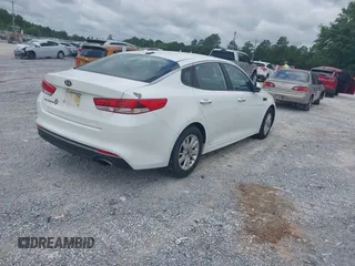 2017 Kia Optima LX z VIN 5XXGT4L32HG161091, wystawiony jako IAAI lot #42266149 z przebiegiem 166 254 mil mil oraz . Historia ofert i sprzedaży dostępna na DreamBid. Obrazek 4.