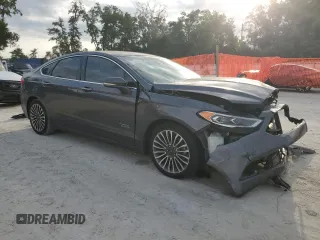 2017 Ford Fusion Titanium z VIN 3FA6P0SU0HR290201, wystawiony jako Copart lot #60106095 z przebiegiem 98 086 mil mil oraz Szkoda całkowita • Salvage title. Historia ofert i sprzedaży dostępna na DreamBid. Obrazek 4.