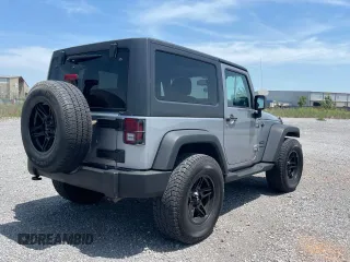 2014 Jeep Wrangler Sport with VIN 1C4AJWAG8EL147947, listed as a Copart auction lot 65750955 with 122,841 mi miles and Clean title. Bid and sale history available at DreamBid. Image 4.