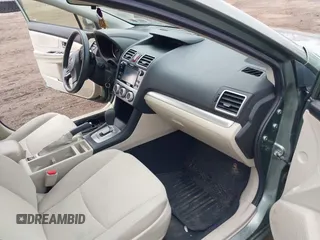 2015 Subaru Impreza Premium z VIN JF1GJAC65FH019578, wystawiony jako IAAI lot #41675318 z przebiegiem 74 769 mil mil oraz . Historia ofert i sprzedaży dostępna na DreamBid. Obrazek 5.