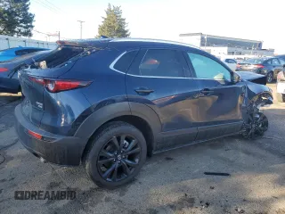 2023 Mazda CX-30 Premium Plus with VIN 3MVDMBEY9PM557107, listed as a Copart auction lot 46893065 with 10,404 mi miles and Salvage title. Bid and sale history available at DreamBid. Image 3.