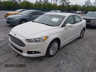 2014 Ford Fusion SE Hybrid with VIN 3FA6P0LU3ER312041, listed as a IAAI auction lot 41964588 with 138,566 mi miles and . Bid and sale history available at DreamBid. Image 17.