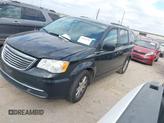 2015 Chrysler Town & Country LX with VIN 2C4RC1AG6FR677178, listed as a IAAI auction lot 41532707 with 135,286 mi miles and . Bid and sale history available at carsss.com. Image 2.