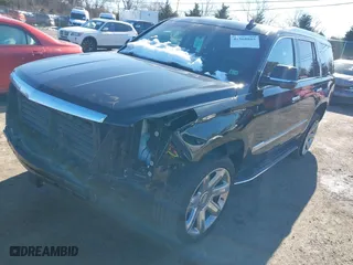 2019 Cadillac Escalade Premium Luxury with VIN 1GYS4CKJ0KR125240, listed as a IAAI auction lot 41568885 with 60,000 mi miles. Bid and sale history available at carsss.com. Image 2.