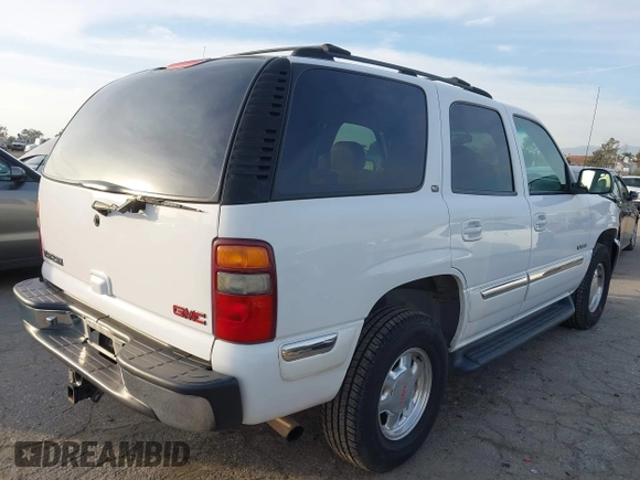 2001 GMC Yukon SLT with VIN 1GKEK13T41R171024, listed as a IAAI auction lot 41582633 with 216,077 mi miles. Bid and sale history available at carsss.com. Image 4.