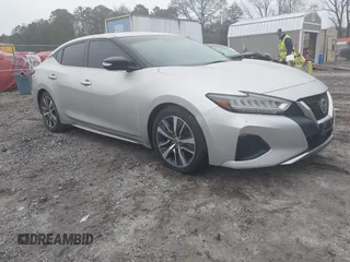 2019 Nissan Maxima Platinum z VIN 1N4AA6AV6KC372254, wystawiony jako IAAI lot #41519515 z przebiegiem 124 326 mil mil oraz . Historia ofert i sprzedaży dostępna na DreamBid. Obrazek 1.