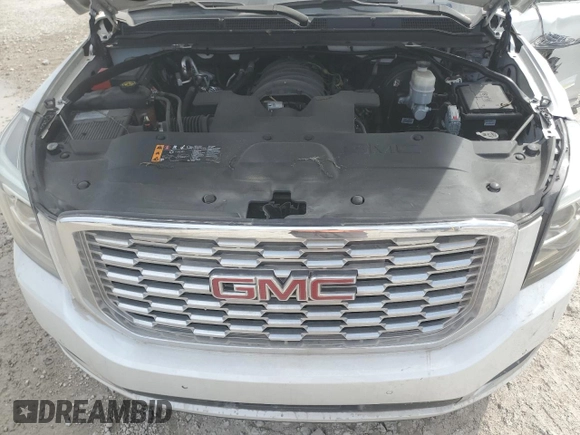 2019 GMC Yukon XL Denali with VIN 1GKS1HKJ3KR251642, listed as a Copart auction lot 76199674 with 0 mi miles and Salvage Title. Bid and sale history available at carsss.com. Image 12.