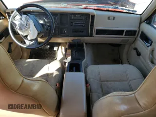 1995 Jeep Cherokee Sport with VIN 1J4FJ68S2SL666126, listed as a Copart auction lot 50496735 with 158,523 mi miles and Salvage title. Bid and sale history available at DreamBid. Image 8.