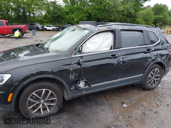 2021 Volkswagen Tiguan SE with VIN 3VV3B7AX6MM021502, listed as a IAAI auction lot 42243705 with 60,988 mi miles and . Bid and sale history available at DreamBid. Image 6.