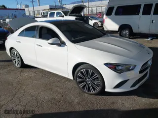 2023 Mercedes-Benz CLA with VIN W1K5J4GBXPN406677, listed as a IAAI auction lot 41306710 with 22,354 mi miles. Bid and sale history available at carsss.com. Image 1.