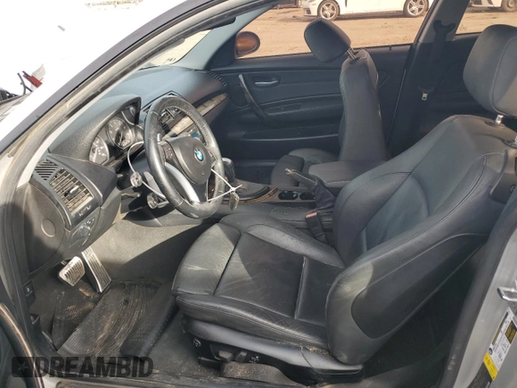 2009 BMW 1 Series 128i with VIN WBAUP93529VF48915, listed as a Copart auction lot 80310034 with 143,208 mi miles and Salvage title. Bid and sale history available at DreamBid. Image 7.