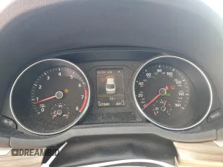 2017 Volkswagen Passat SEL Premium z VIN 1VWCT7A32HC077806, wystawiony jako Copart lot #47272815 z przebiegiem 127 040 mil mil oraz Szkoda całkowita • Salvage title. Historia ofert i sprzedaży dostępna na DreamBid. Obrazek 9.