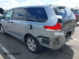 2013 Toyota Sienna L with VIN 5TDZK3DC9DS298333, listed as a IAAI auction lot 41941011 with 141,021 mi miles. Bid and sale history available at carsss.com. Image 3.