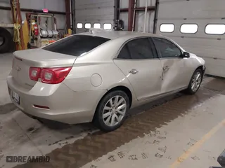 2013 Chevrolet Malibu LTZ with VIN 1G11H5SAXDF236151, listed as a IAAI auction lot 41720812 with 181,159 mi miles. Bid and sale history available at carsss.com. Image 4.