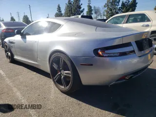 2007 Aston Martin DB9 z VIN SCFAB01A37GA08055, wystawiony jako Copart lot #82733743 z przebiegiem 39 201 mil mil oraz . Historia ofert i sprzedaży dostępna na DreamBid. Obrazek 2.