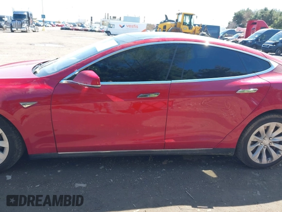 2014 Tesla Model S 60 with VIN 5YJSA1H11EFP37791, listed as a IAAI auction lot 41995504 with 84,371 mi miles and . Bid and sale history available at DreamBid. Image 14.