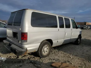 2004 Ford Econoline Passenger XL with VIN 1FMRE11W54HB15178, listed as a Copart auction lot 83088104 with 248,516 mi miles and Salvage Title. Bid and sale history available at DreamBid. Image 3.
