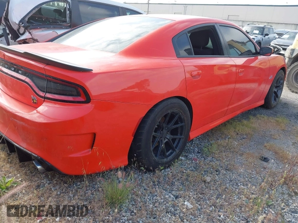 2020 Dodge Charger Scat Pack z VIN 2C3CDXGJ1LH221572, wystawiony jako IAAI lot #41286078 z przebiegiem 67 514 mil mil oraz . Historia ofert i sprzedaży dostępna na DreamBid. Obrazek 4.