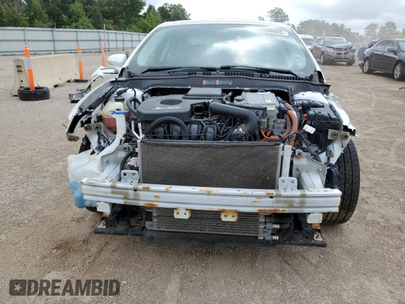 2016 Ford Fusion SE Hybrid with VIN 3FA6P0LUXGR184285, listed as a Copart auction lot 62699805 with 132,264 mi miles and Salvage title. Bid and sale history available at DreamBid. Image 5.
