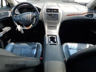 2016 Lincoln MKZ z VIN 3LN6L2JK1GR617572, wystawiony jako Copart lot #59119845 z przebiegiem 155 191 mil mil oraz Szkoda całkowita • Salvage title. Historia ofert i sprzedaży dostępna na DreamBid. Obrazek 8.