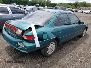 1996 Mercury Mystique z VIN 3MELM6530TM601366, wystawiony jako Copart lot #74239734 z przebiegiem 90 989 mil mil oraz Nie do naprawy. Historia ofert i sprzedaży dostępna na DreamBid. Obrazek 3.
