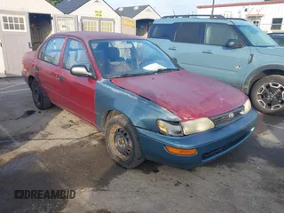 1994 Toyota Corolla with VIN JT2AE04B9R0061094, listed as a IAAI auction lot 42513810 with 135,545 mi miles and . Bid and sale history available at DreamBid. Image 1.