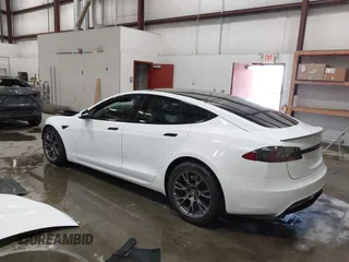 2022 Tesla Model S with VIN 5YJSA1E59NF469984, listed as a IAAI auction lot 42426490 with Not provided miles and . Bid and sale history available at DreamBid. Image 3.
