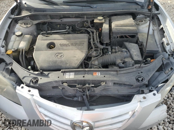 2006 Mazda 3 s with VIN JM1BK324261542255, listed as a Copart auction lot 84252034 with 196,030 mi miles and Salvage Title. Bid and sale history available at DreamBid. Image 11.