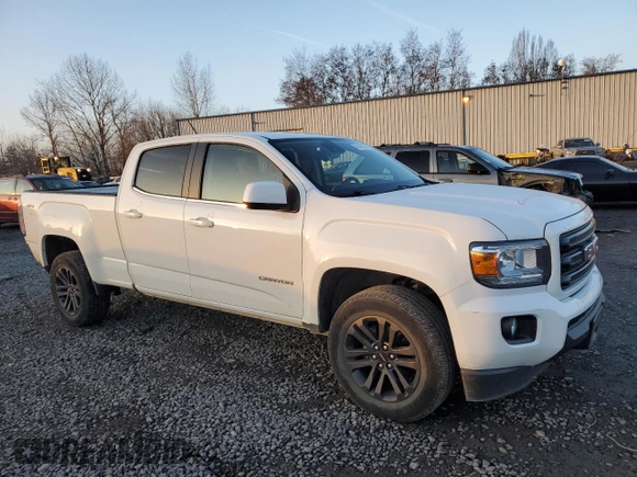 2019 GMC Canyon 4WD SLE with VIN 1GTG6CEN0K1293351, listed as a Copart auction lot 88470035 with 49,469 mi miles and Salvage Title. Bid and sale history available at carsss.com. Image 4.