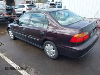 2000 Honda Civic LX with VIN 1HGEJ6676YL036362, listed as a IAAI auction lot 41912249 with 135,112 mi miles. Bid and sale history available at carsss.com. Image 3.