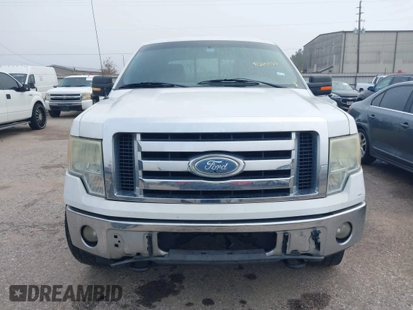 2009 Ford F-150 XL with VIN 1FTPW14V89FB30515, listed as a IAAI auction lot 41210636 with 220,187 mi miles. Bid and sale history available at carsss.com. Image 12.