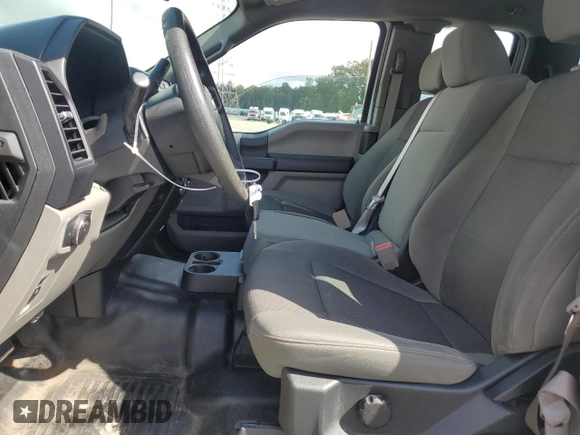 2018 Ford F-150 XL with VIN 1FTEX1C59JKD46536, listed as a Copart auction lot 63029325 with 111,644 mi miles and Clean title. Bid and sale history available at DreamBid. Image 7.