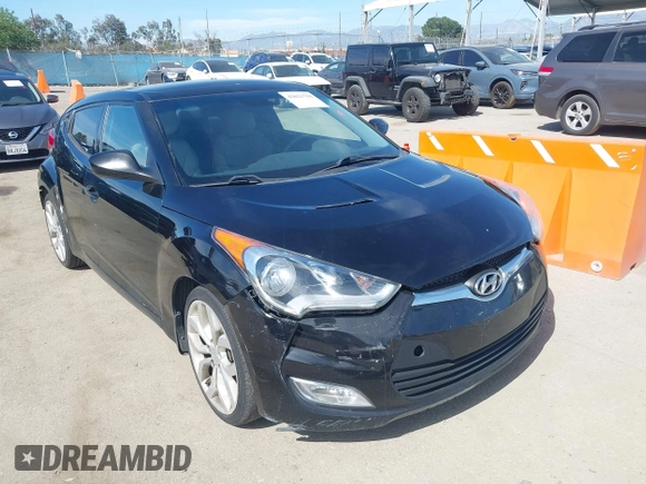 2013 Hyundai Veloster w/Black Int with VIN KMHTC6AD4DU132701, listed as a IAAI auction lot 42021759 with 102,840 mi miles and . Bid and sale history available at DreamBid. Image 1.