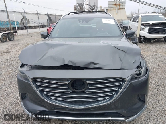 2016 Mazda CX-9 Grand Touring with VIN JM3TCBDY1G0103560, listed as a IAAI auction lot 41344813 with 123,588 mi miles and . Bid and sale history available at DreamBid. Image 12.