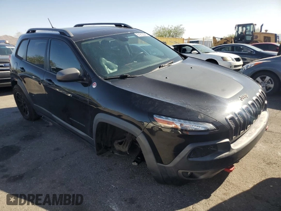 2015 Jeep Cherokee Trailhawk with VIN 1C4PJMBS8FW699319, listed as a Copart auction lot 61612245 with 173,581 mi miles and Clean title. Bid and sale history available at DreamBid. Image 4.