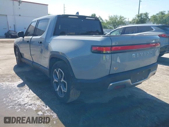 2022 Rivian R1T Adventure z VIN 7FCTGAAA2NN006053, wystawiony jako IAAI lot #41974199 z przebiegiem 286 mil mil oraz . Historia ofert i sprzedaży dostępna na DreamBid. Obrazek 3.