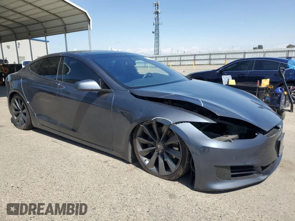 2016 Tesla Model S 90D with VIN 5YJSA1E22GF177120, listed as a Copart auction lot 51972885 with 73,441 mi miles and Salvage title. Bid and sale history available at DreamBid. Image 4.