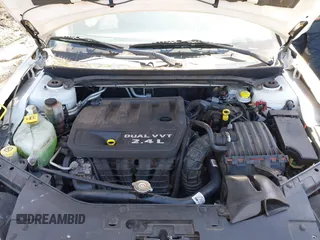 2014 Chrysler 200 LX with VIN 1C3CCBAB2EN208735, listed as a IAAI auction lot 41623000 with 104,819 mi miles and . Bid and sale history available at carsss.com. Image 10.
