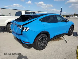 2024 Ford Mustang Mach-E Premium z VIN 3FMTK3R72RMA32365, wystawiony jako Copart lot #44407065 z przebiegiem 3 940 mil mil oraz Szkoda całkowita • Salvage title. Historia ofert i sprzedaży dostępna na DreamBid. Obrazek 3.