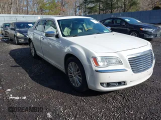 2013 Chrysler 300 with VIN 2C3CCAKGXDH733148, listed as a IAAI auction lot 41541442 with 216,074 mi miles. Bid and sale history available at carsss.com. Image 1.