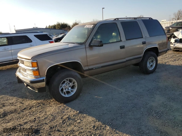 1996 Chevrolet Tahoe with VIN 1GNEK13R2TJ354351, listed as a Copart auction lot 43276385 with 2,526,567 mi miles and Salvage Title. Bid and sale history available at carsss.com. Image 1.